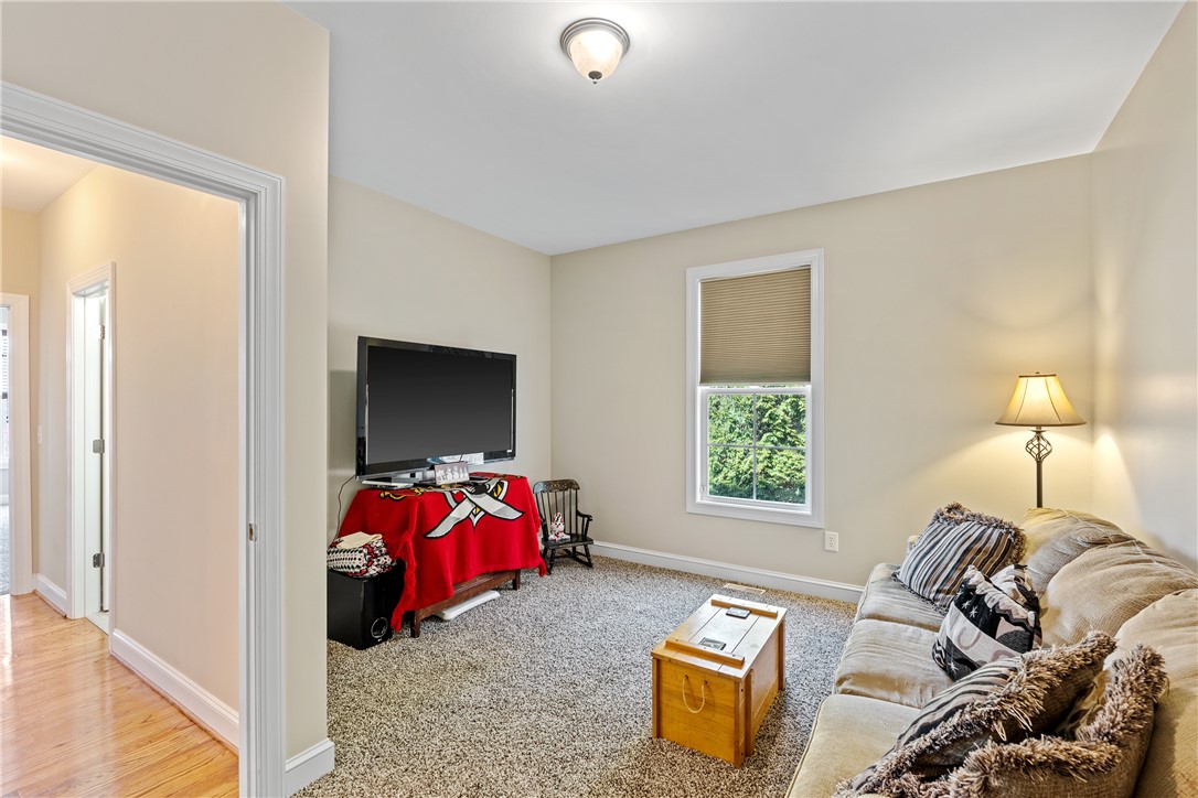 119 Turnberry Road Anderson, SC 29621 - Photo 38 of 50 This versatile room offers comfortable living with natural light and soft carpeting.