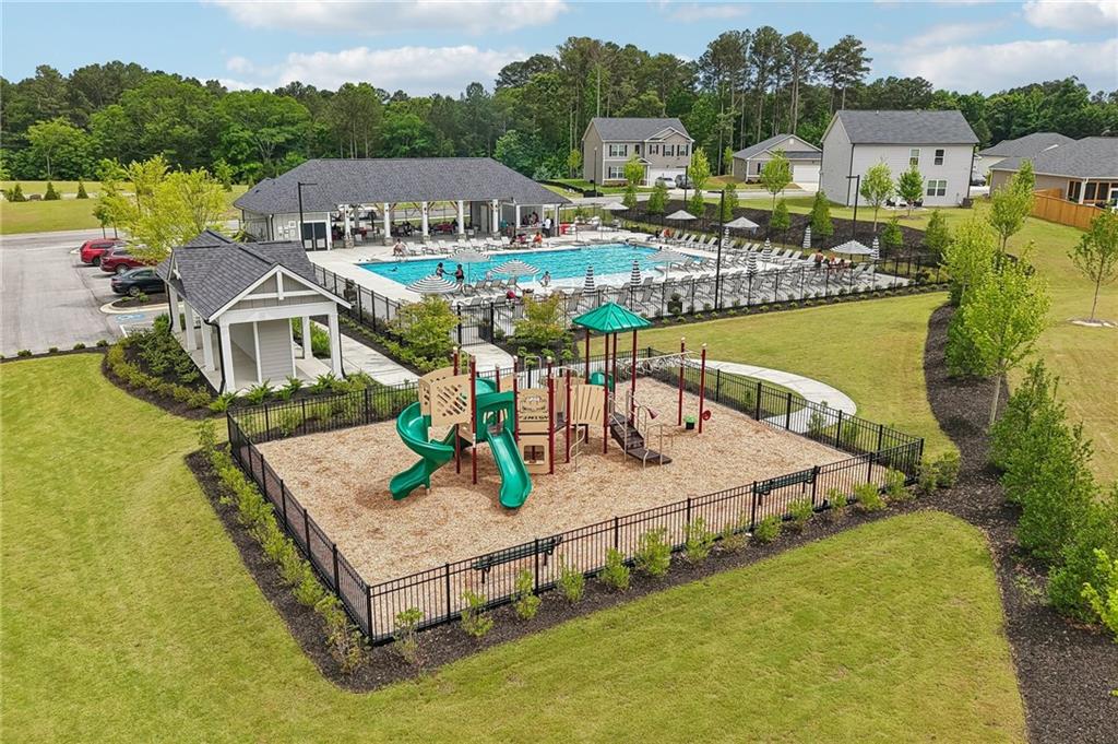8592 Seabiscuit Road Lithonia, GA 30058 - Photo 25 of 25 a view of a house with outdoor space and sitting area