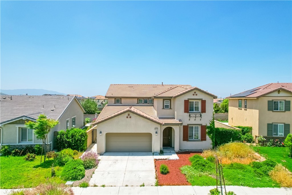 6859 Cache Way Jurupa Valley, CA 91752 - Photo 1 of 1 front view of a house with a yard