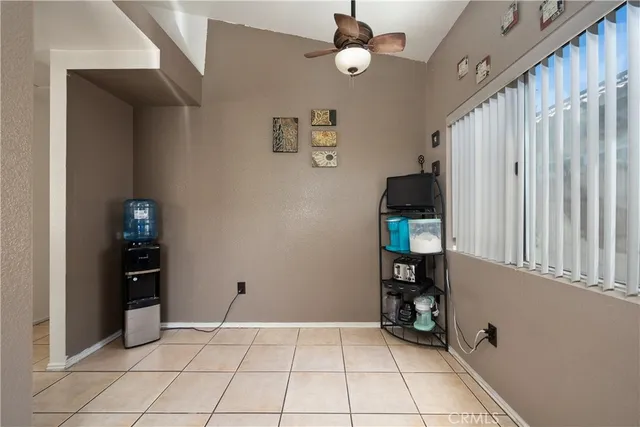 a view of an empty room and shelves