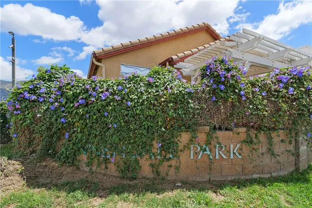 a front view of a house with garage
