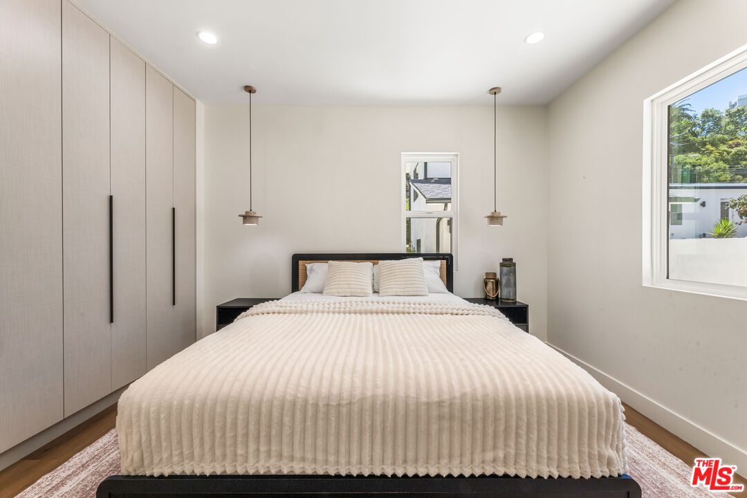 266 Mabery Road Santa Monica, CA 90402 - Photo 11 of 47 a bedroom with a bed and a window
