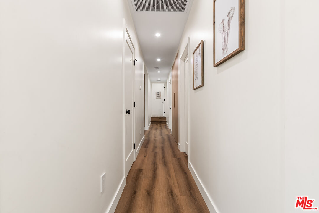 266 Mabery Road Santa Monica, CA 90402 - Photo 16 of 47 a view of a hallway with wooden floor