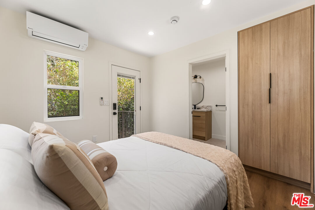 266 Mabery Road Santa Monica, CA 90402 - Photo 41 of 47 a bedroom with a bed and a window