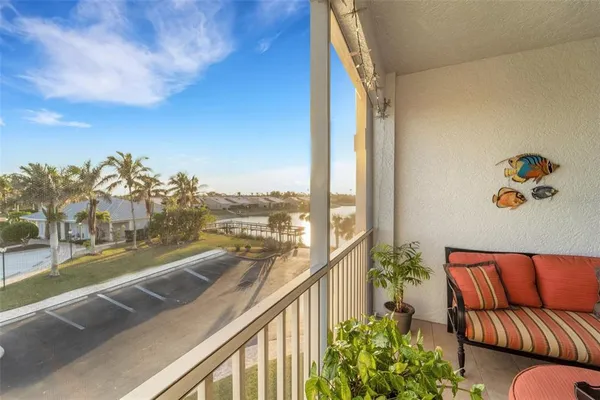 a view of balcony with furniture