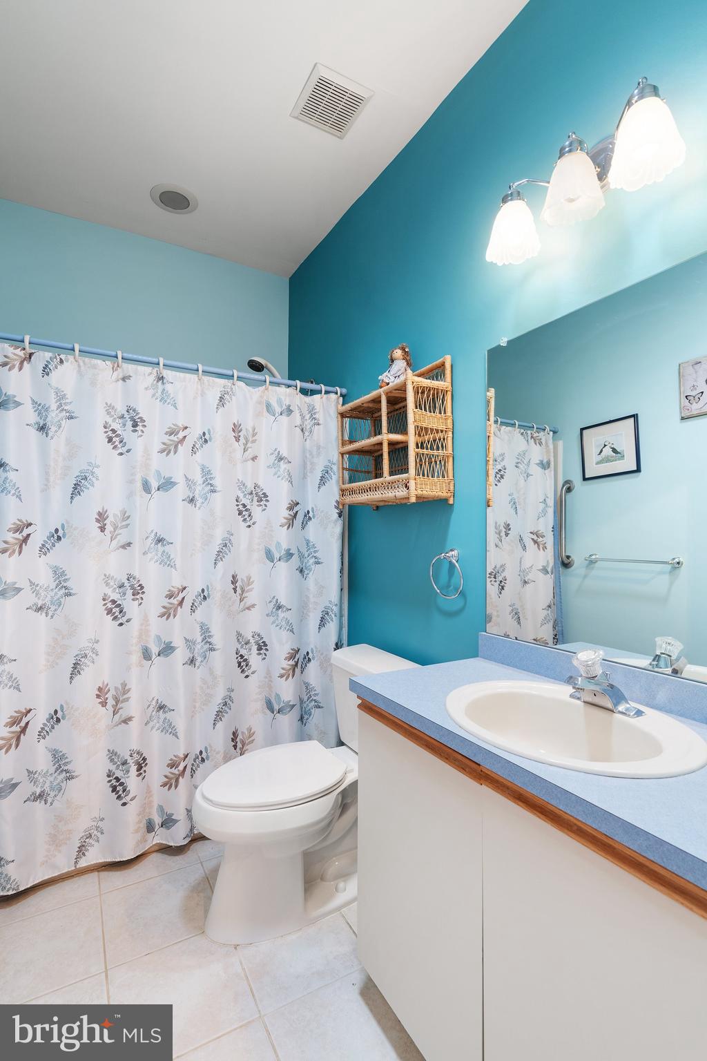 10 Hampton Road Manahawkin, NJ 08050 - Photo 21 of 36 a bathroom with a sink toilet and shower