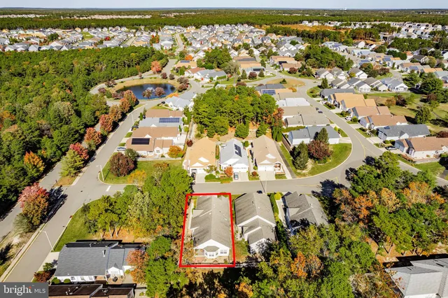 a view of a chairs and table in the patio