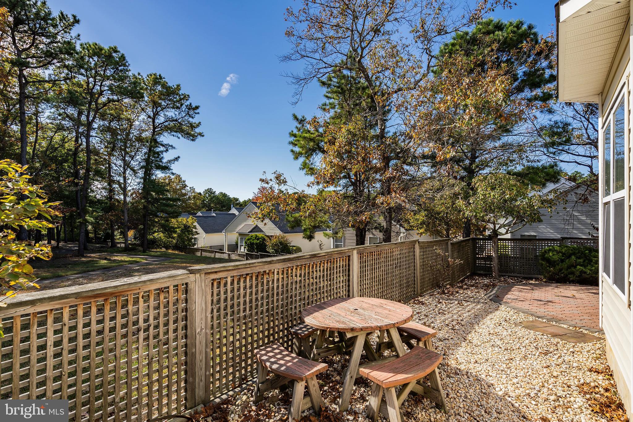 10 Hampton Road Manahawkin, NJ 08050 - Photo 26 of 36 a view of a chairs and table in the patio