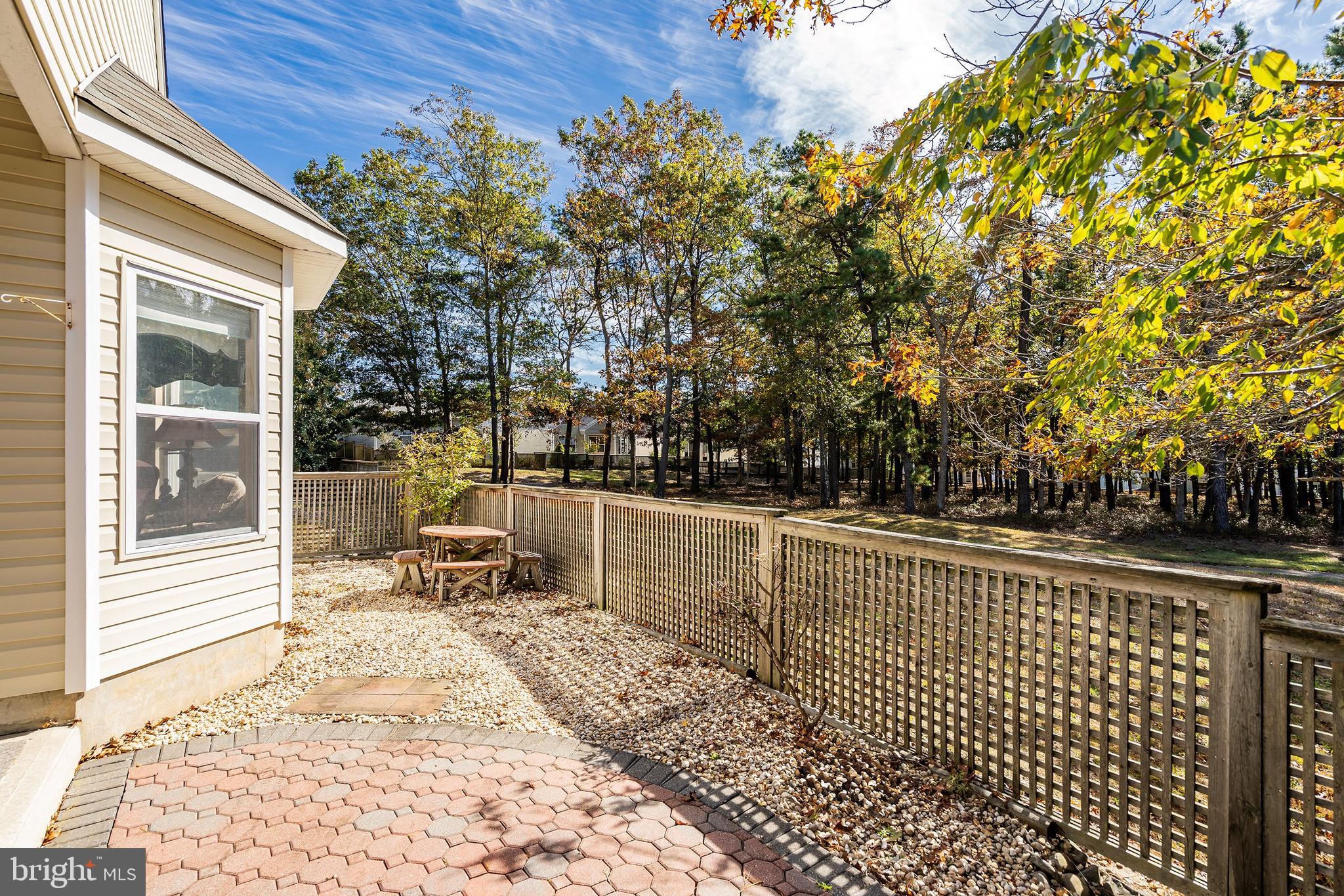 10 Hampton Road Manahawkin, NJ 08050 - Photo 27 of 36 a bench is sitting in middle of a house