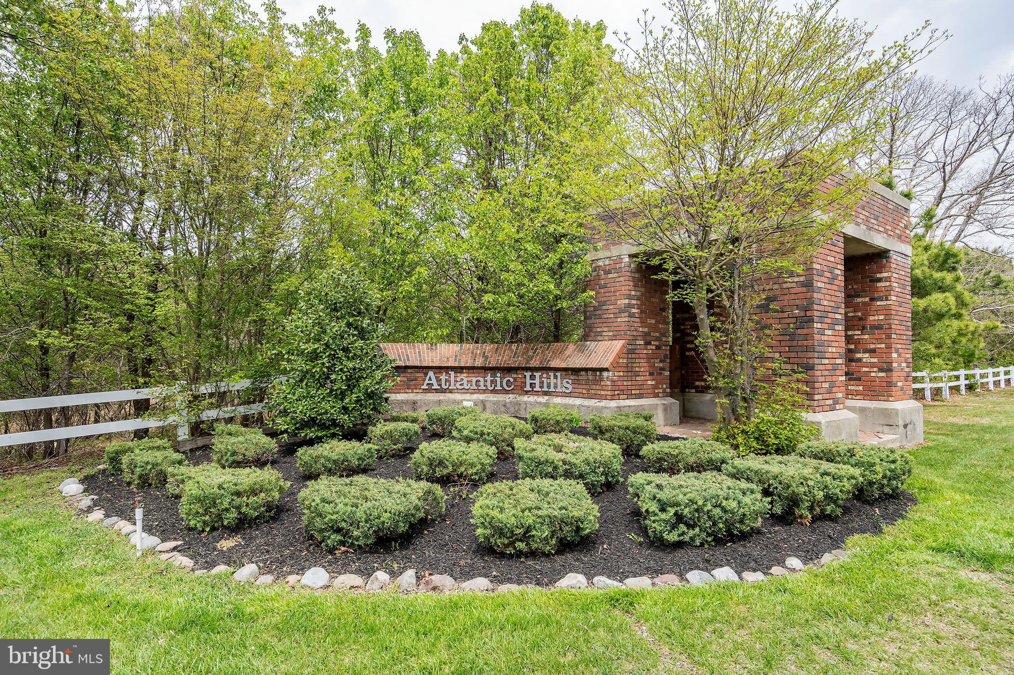 10 Hampton Road Manahawkin, NJ 08050 - Photo 30 of 36 a view of a house with a backyard and a tree