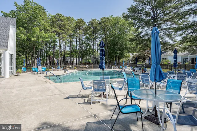 a view of a park with swings and slides