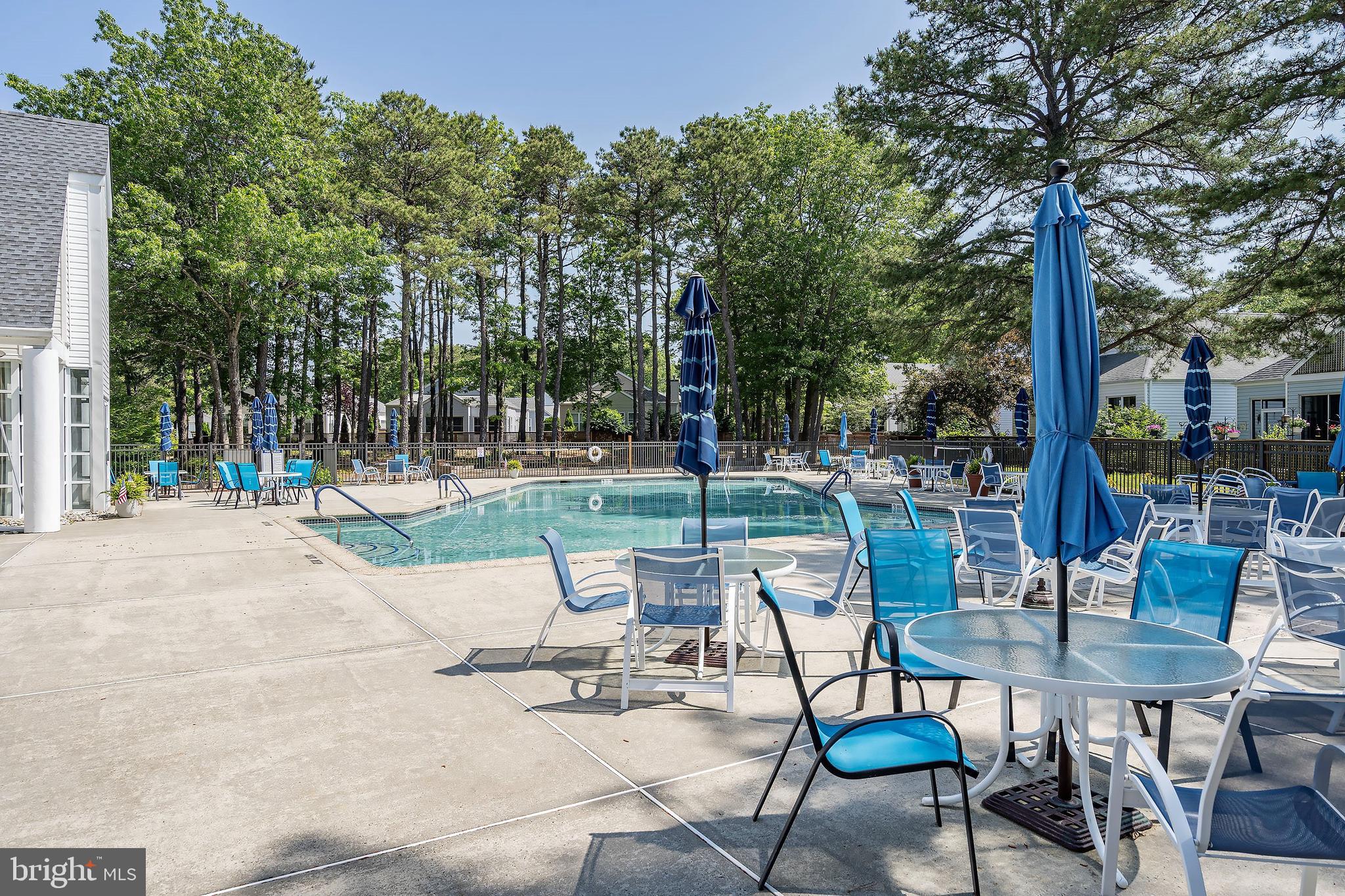 10 Hampton Road Manahawkin, NJ 08050 - Photo 33 of 36 a view of a chairs and tables in the patio