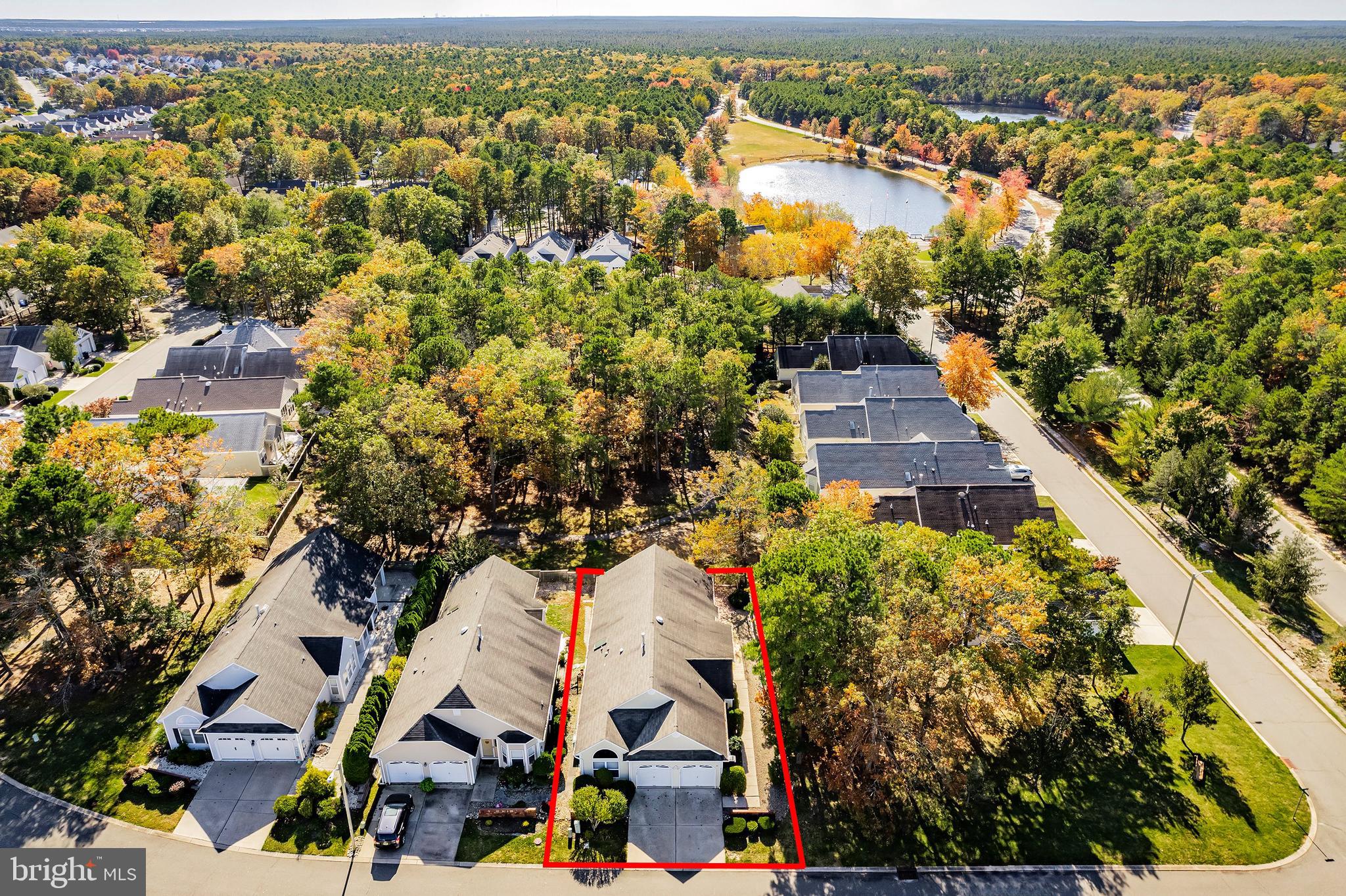 10 Hampton Road Manahawkin, NJ 08050 - Photo 5 of 36 an aerial view of residential houses with outdoor space