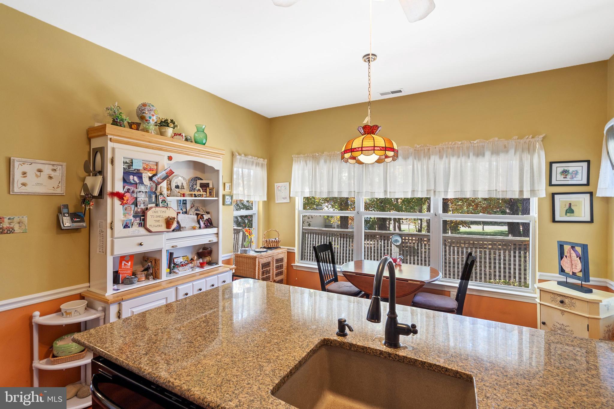 10 Hampton Road Manahawkin, NJ 08050 - Photo 10 of 36 a living room with furniture and a flat screen tv