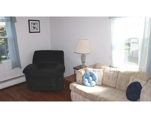 82 Edgewater Road Hull, MA 02045 - Photo 12 of 25 a living room with furniture and a window
