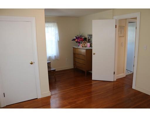 82 Edgewater Road Hull, MA 02045 - Photo 13 of 25 a view of a hallway with wooden floor