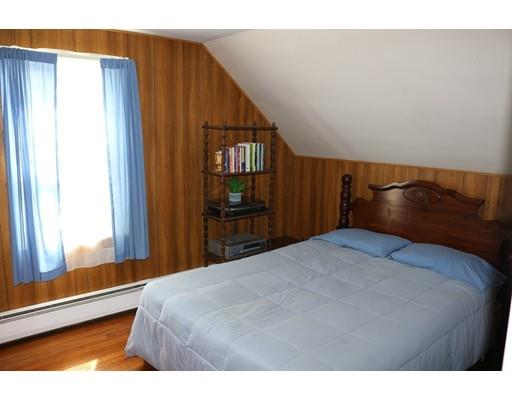 82 Edgewater Road Hull, MA 02045 - Photo 15 of 25 a bedroom with a bed and a window