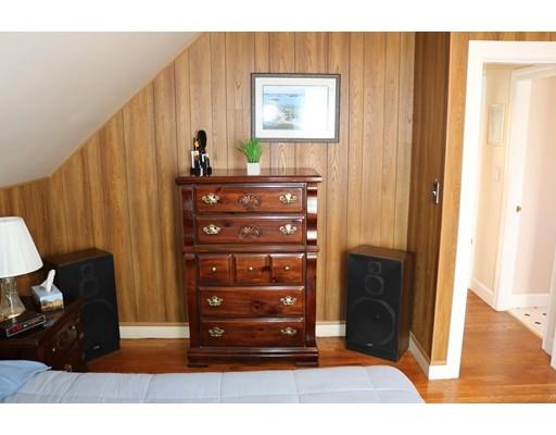 82 Edgewater Road Hull, MA 02045 - Photo 16 of 25 a view of a bedroom with a furniture and wooden floor