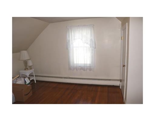 82 Edgewater Road Hull, MA 02045 - Photo 17 of 25 a black and white photo of a living room