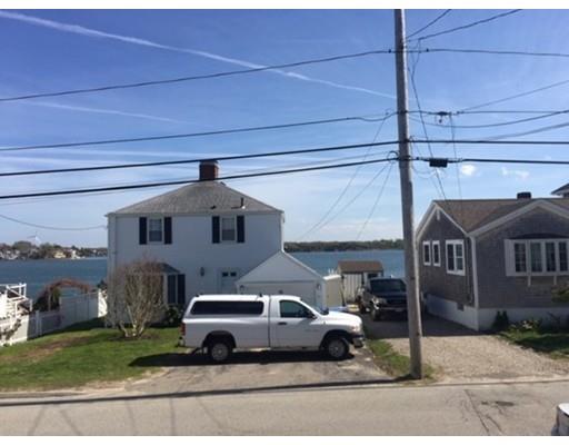82 Edgewater Road Hull, MA 02045 - Photo 22 of 25 a car parked in front of garage