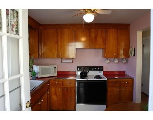 82 Edgewater Road Hull, MA 02045 - Photo 8 of 25 a kitchen with a stove and a refrigerator