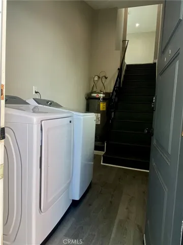 a view of kitchen electric appliances and cabinets