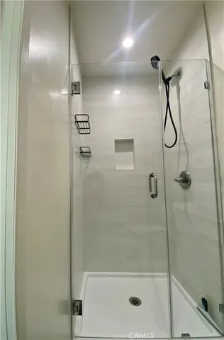 a close view of utility room with washer and dryer