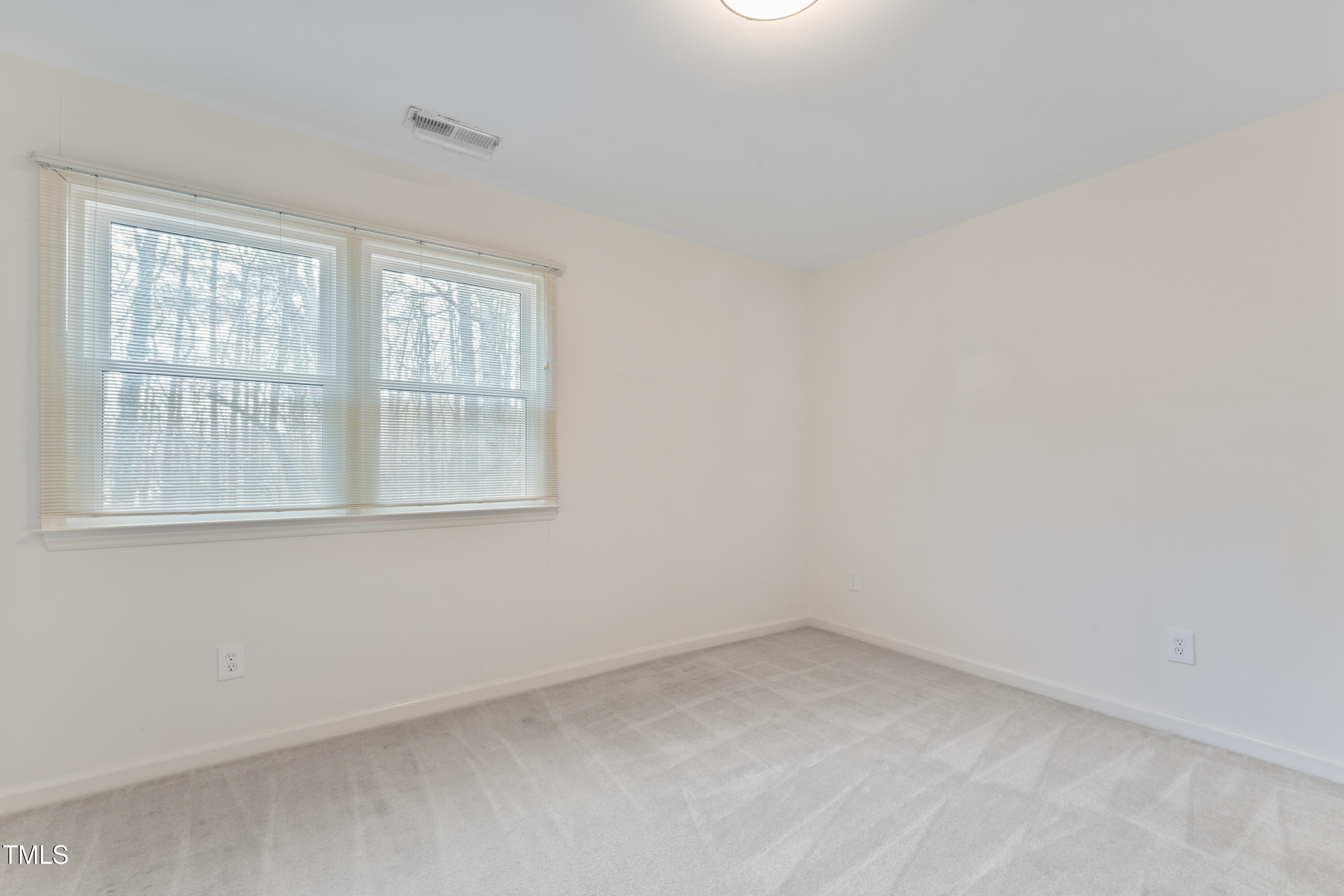111 Legacy Lane Durham, NC 27713 - Photo 22 of 24 an empty room with a window