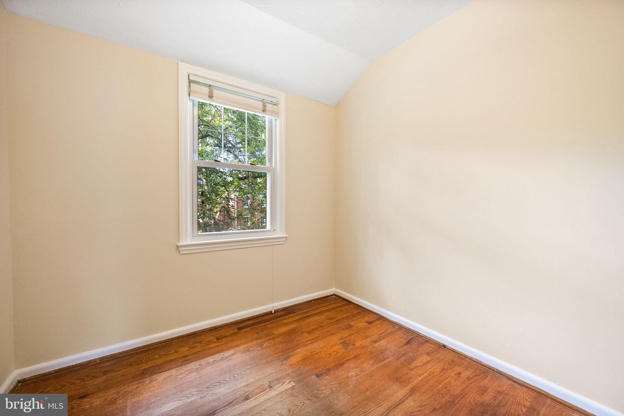 4937 11th Street Northeast Washington, DC 20017 - Photo 17 of 28 a view of empty room with wooden floor and fan