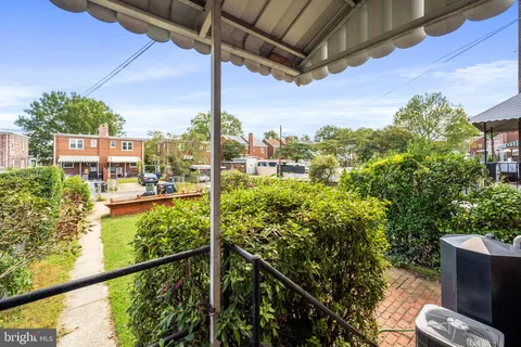 a view of yard from balcony