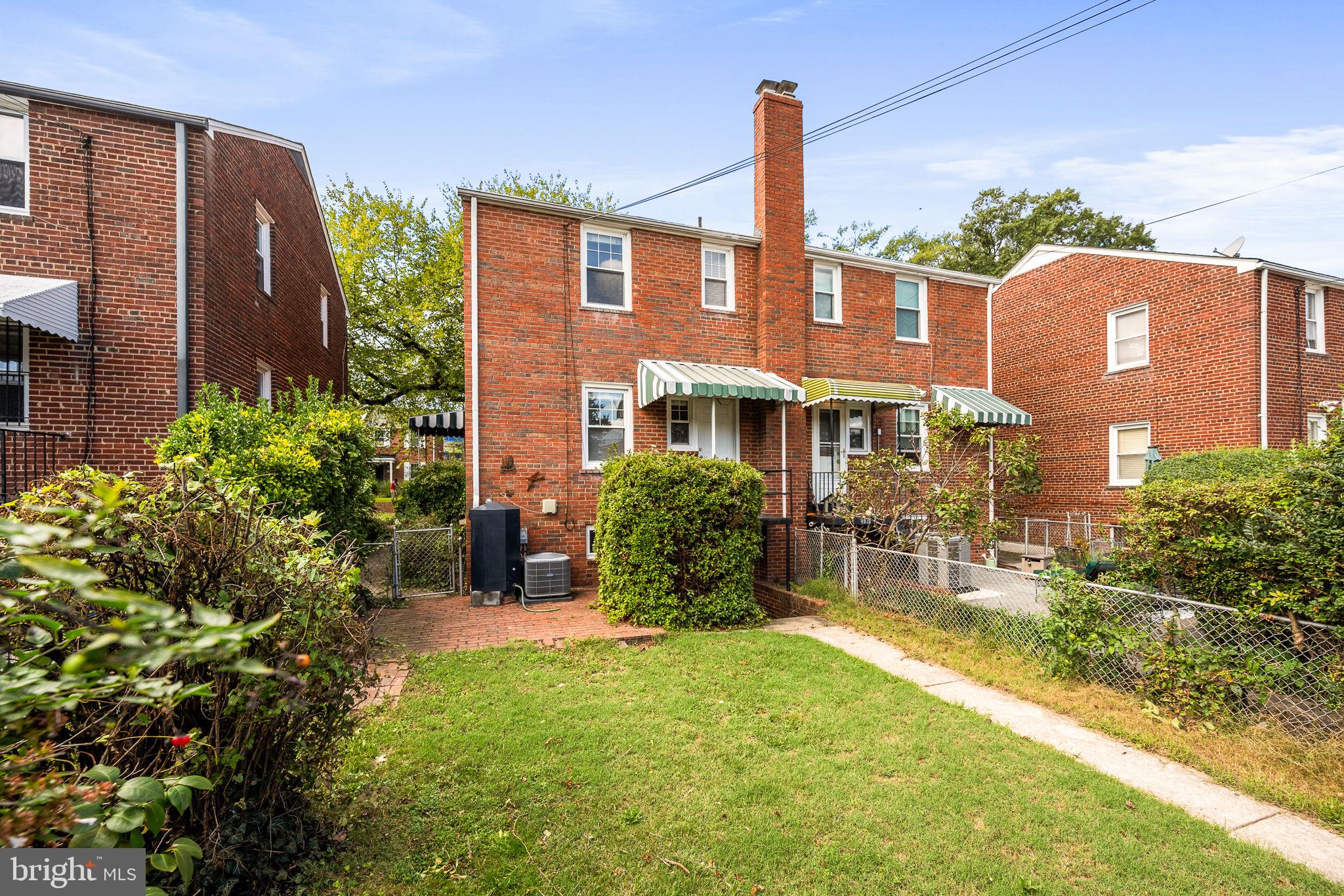 4937 11th Street Northeast Washington, DC 20017 - Photo 28 of 28 a front view of a house with garden