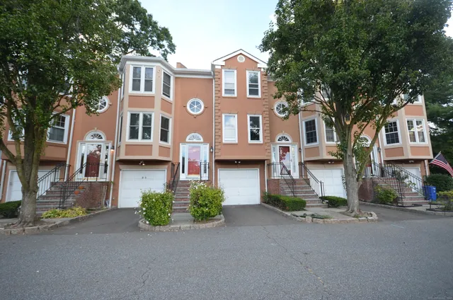 a front view of a building with a street