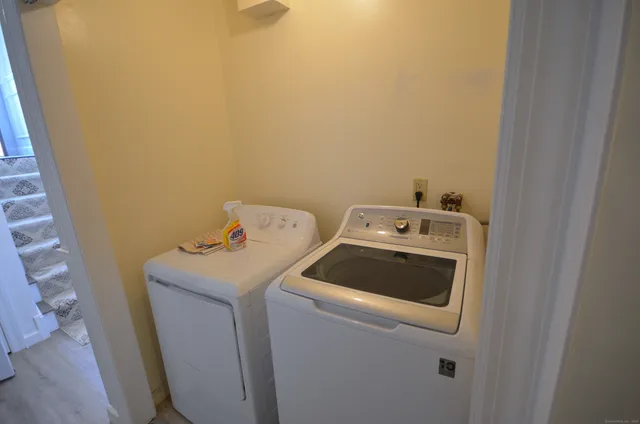 a utility room with dryer and washer