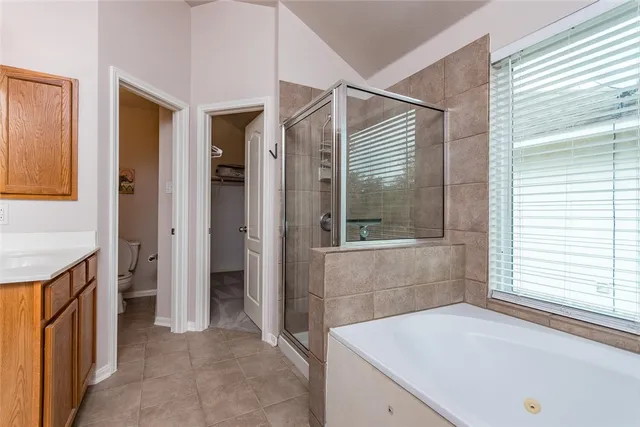 a bathroom with a sink and a large mirror