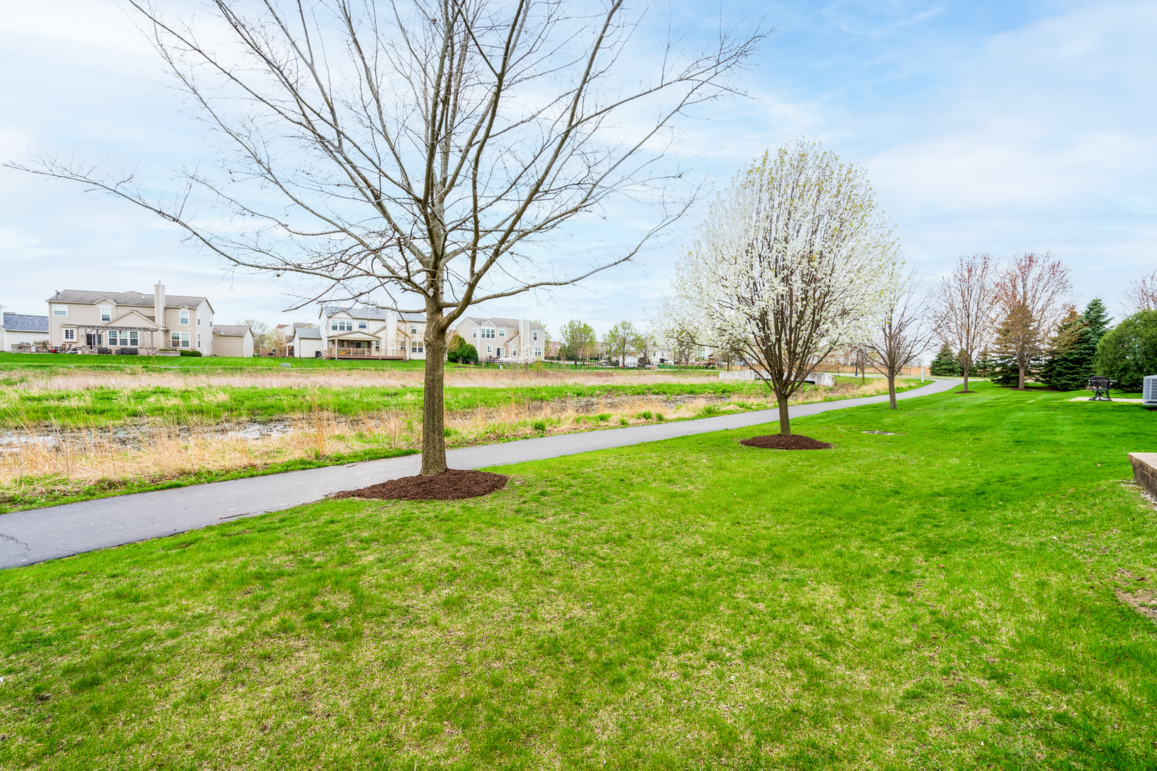 15311 Pinewood Road, Unit 15311 Lockport, IL 60441 - Photo 16 of 17 a view of a field of grass and trees