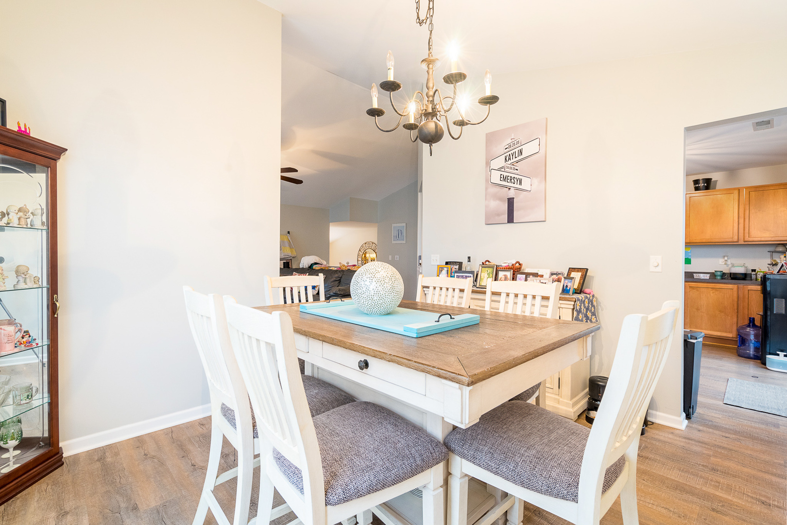 15311 Pinewood Road, Unit 15311 Lockport, IL 60441 - Photo 3 of 17 a dining room with furniture and wooden floor