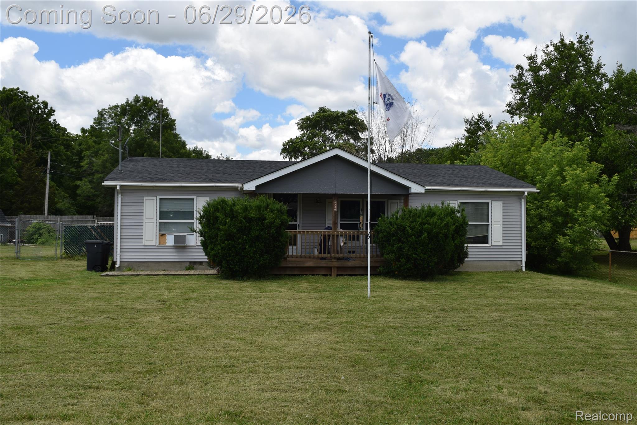 Ranch-style exterior featuring light gray newer (2024) vinyl siding and a newer (2024) dark shingle roof