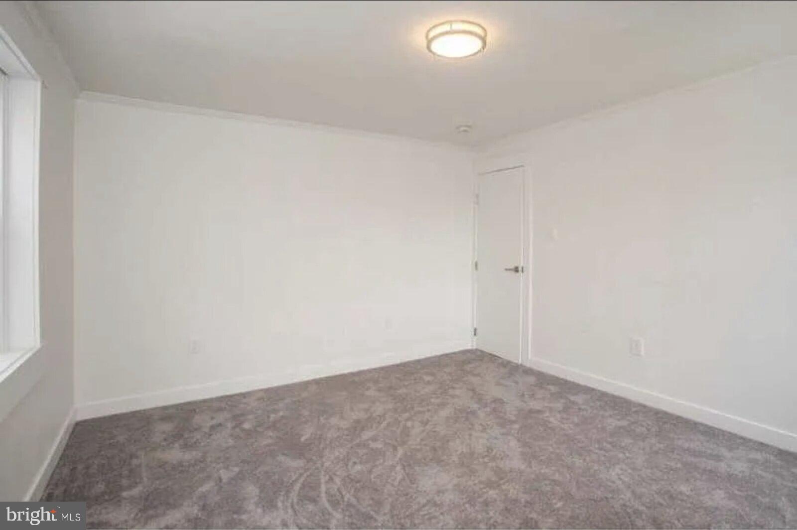 5 Coates Street Bridgeport, PA 19405 - Photo 14 of 28 an empty room with an oven