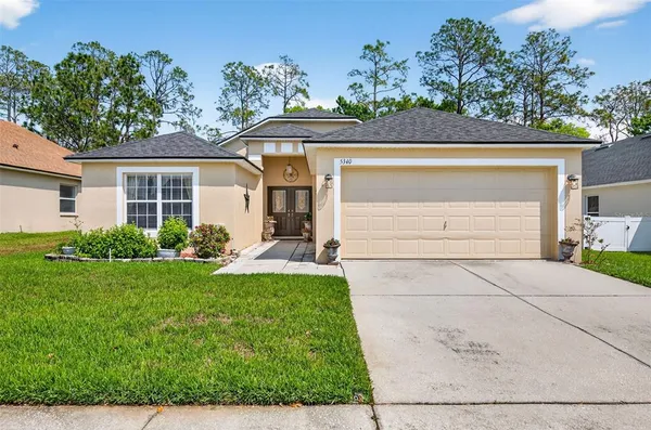 front view of house with a yard