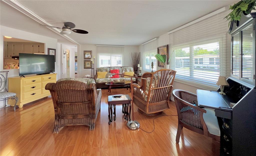 1100 South Belcher Road, Unit 245 Largo, FL 33771 - Photo 13 of 69 a living room with furniture and a flat screen tv