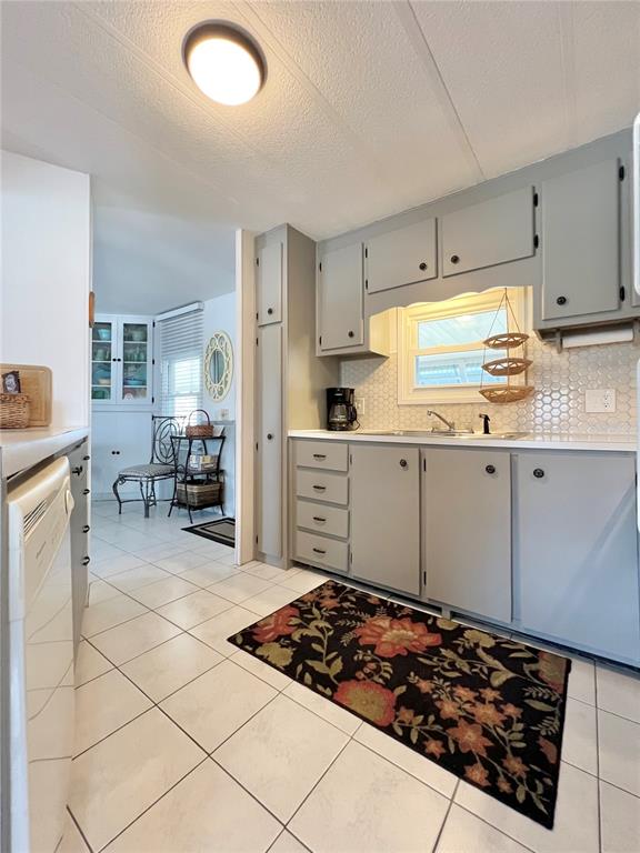 1100 South Belcher Road, Unit 245 Largo, FL 33771 - Photo 25 of 69 a kitchen with stainless steel appliances a stove a sink and white cabinets