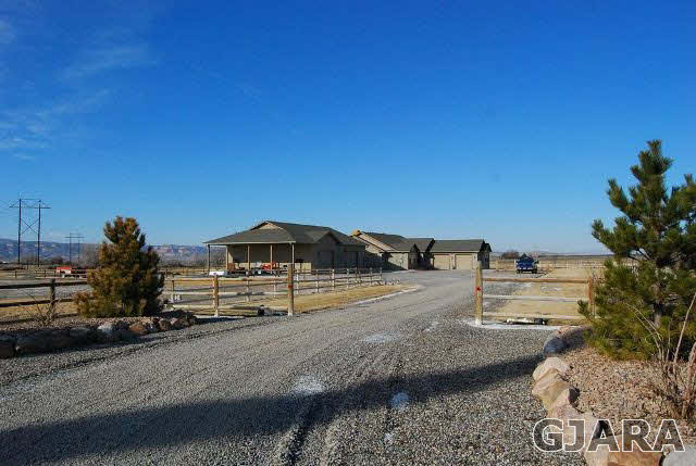 1677 P Road Loma, CO 81524 - Photo 13 of 14 a view of a terrace with a bench