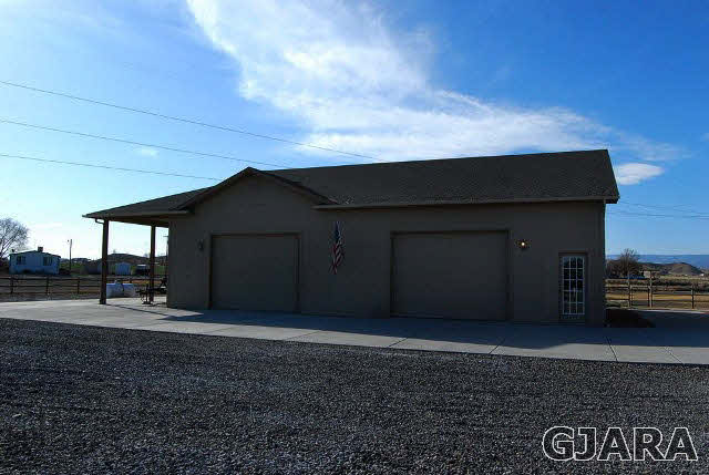 1677 P Road Loma, CO 81524 - Photo 14 of 14 a front view of a house