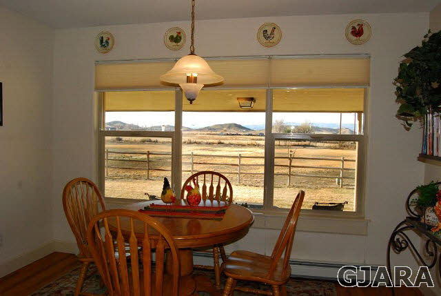 1677 P Road Loma, CO 81524 - Photo 5 of 14 a view of a dining room with furniture window and outside view