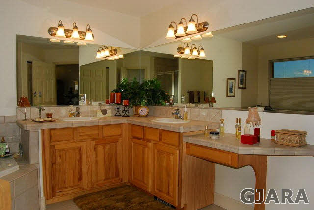1677 P Road Loma, CO 81524 - Photo 6 of 14 a bathroom with a sink and a mirror