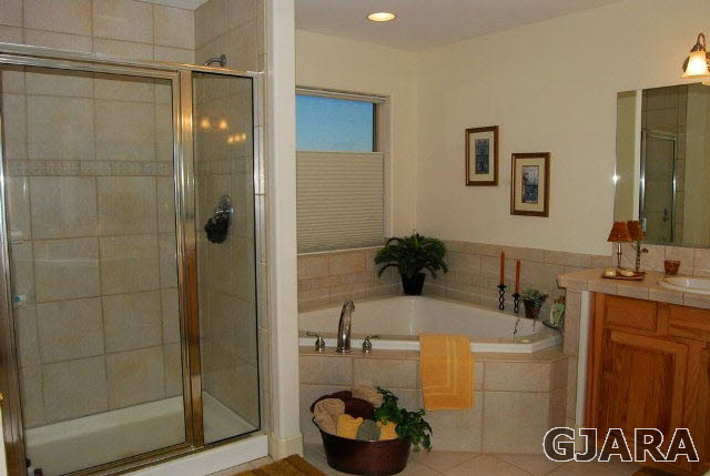 1677 P Road Loma, CO 81524 - Photo 9 of 14 a bathroom with a sink and a mirror