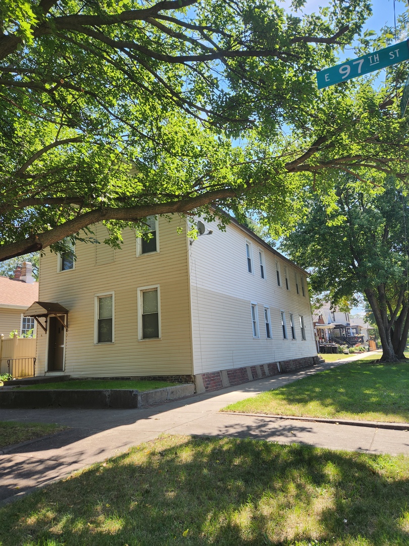 a house view with a garden space