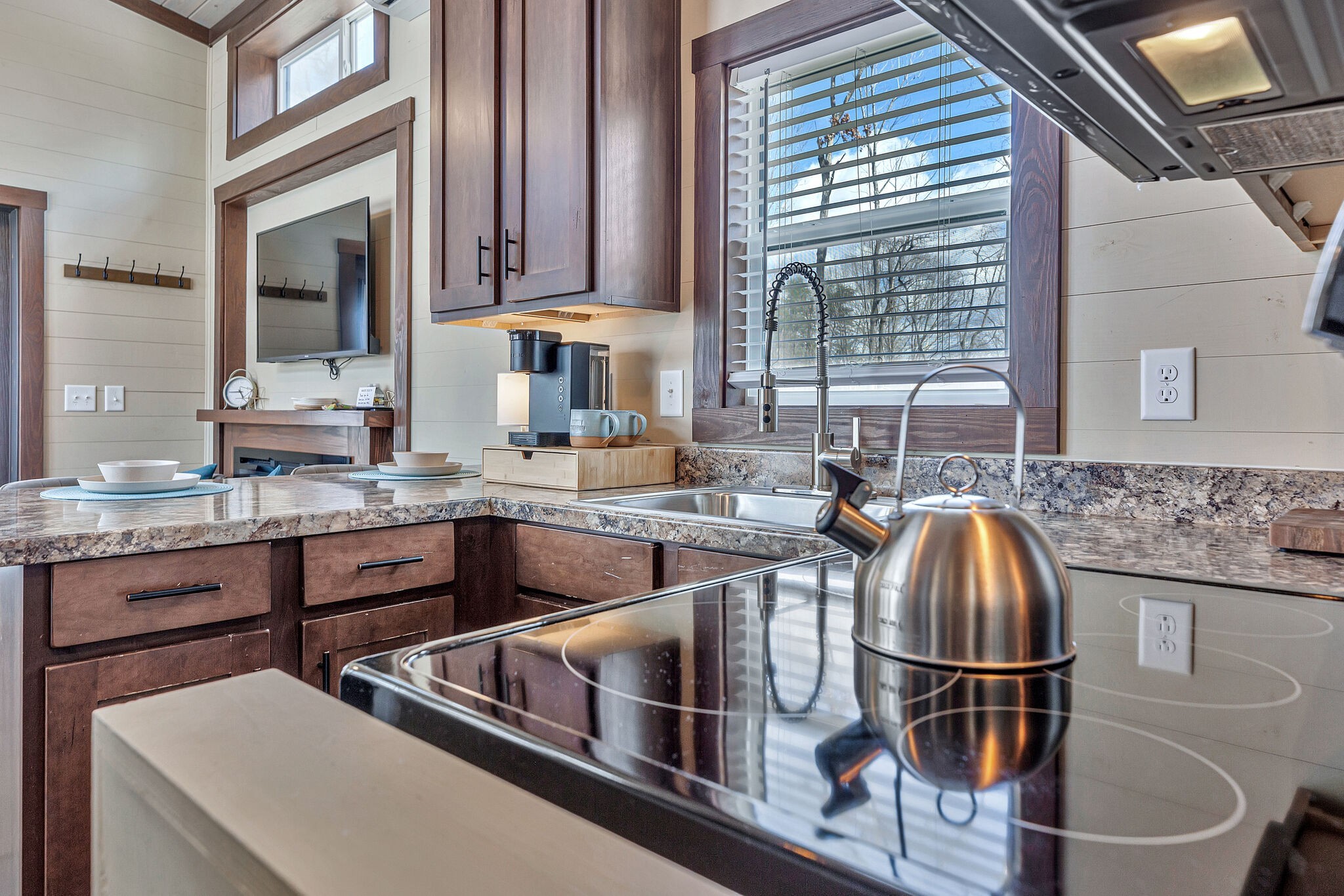 42 Oakleaf Trail Tracy City, TN 37387 - Photo 17 of 73 a kitchen with kitchen island granite countertop a stove and a sink