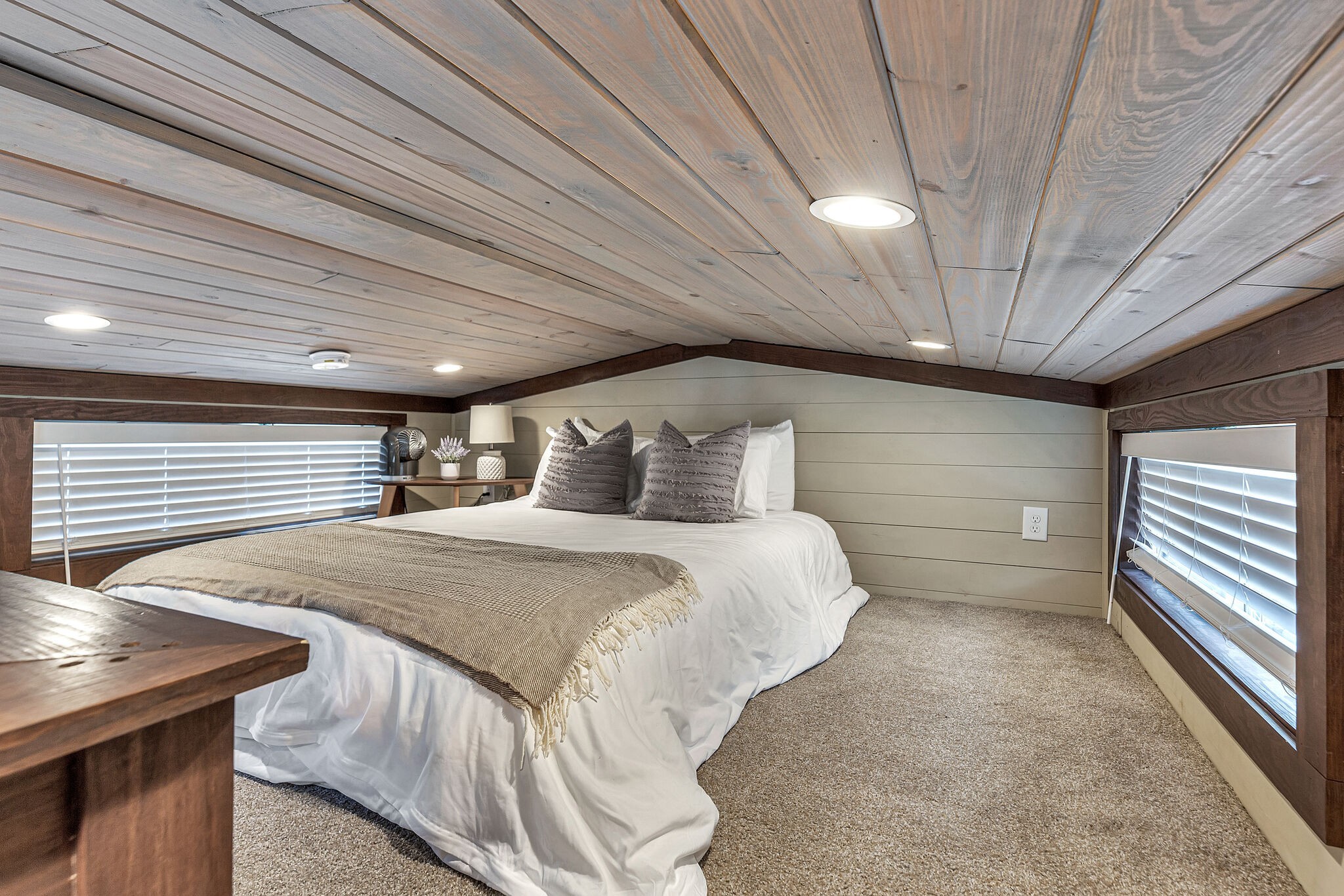 42 Oakleaf Trail Tracy City, TN 37387 - Photo 26 of 73 a spacious bedroom with a bed and a chandelier