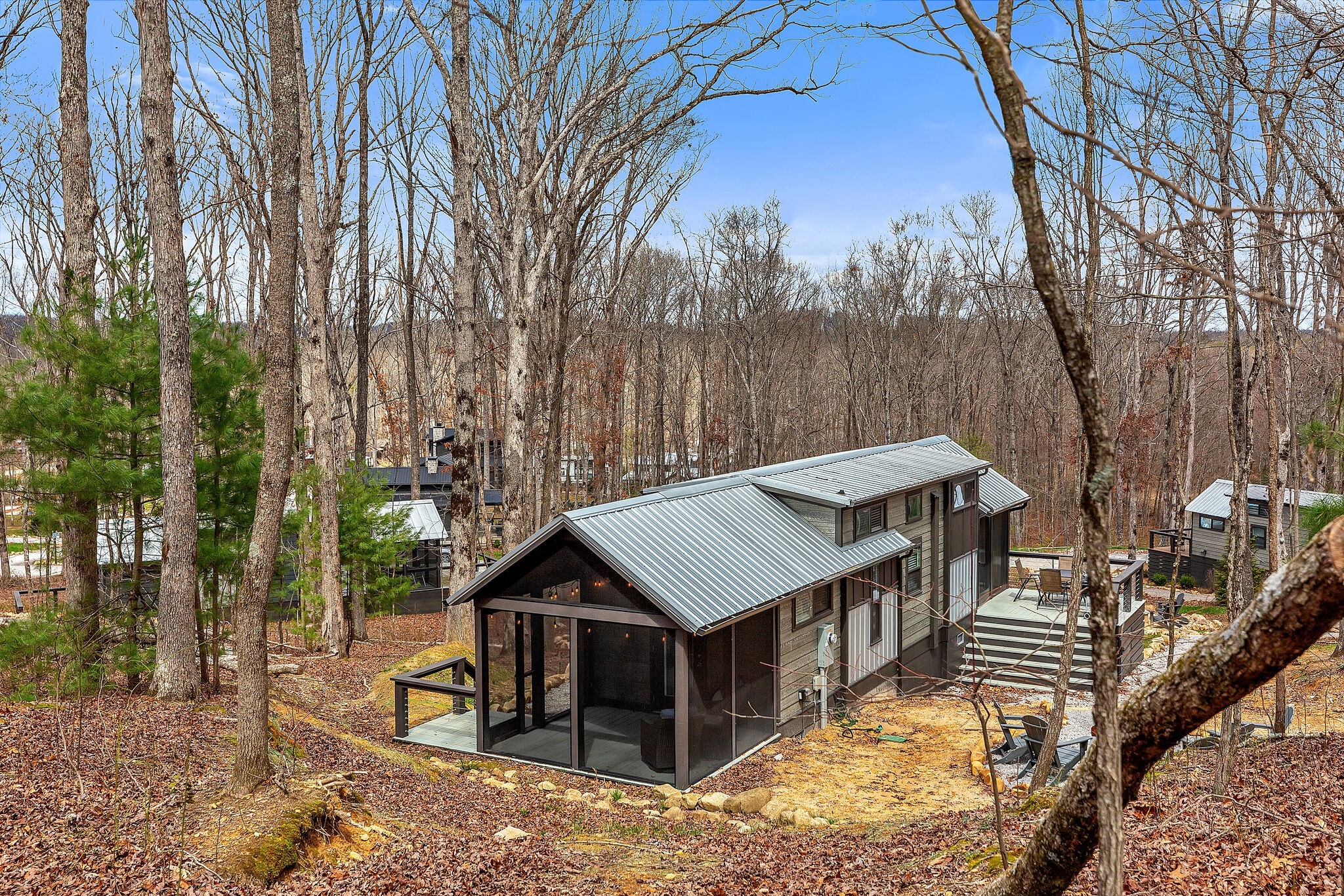 42 Oakleaf Trail Tracy City, TN 37387 - Photo 37 of 73 a view of a house with roof deck front of house